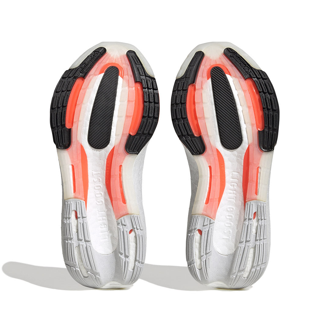 נעלי ריצה מקצועיות ULTRABOOST LIGHT נשים - לבן / כתום